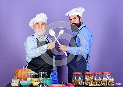 Good team. cereals and seasoning. professional restaurant cook. Halloween pumpkin recipe. Chef men cooking. cheerful men Stock Photo