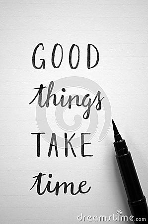 GOOD THINGS TAKE TIME hand-lettered in notebook Stock Photo