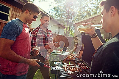 Good vibes with great friends. a group of friends having a barbecue outside. Stock Photo
