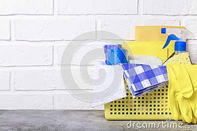 Goods for cleaning. Accessories supplies for housework and cleanliness and order. Cleaning products on background with Stock Photo