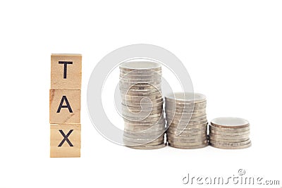 Goods and Services Tax word on stack coins Stock Photo