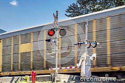 Goods Train at a Level Crossing Stock Photo