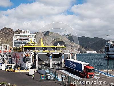 Goods transport truck entering the garage of the Fred Olsen Express ferry in the Port of Santa Cruz de Tenerife Editorial Stock Photo