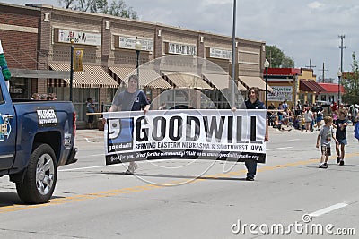 Goodwill Banner in parade in small town America Editorial Stock Photo