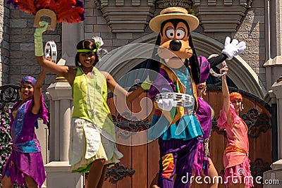 Goofy dancing with The princess and the frog characters in Magic Kingdom 4 Editorial Stock Photo