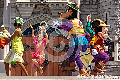 Goofy dancing with The princess and the frog characters in Magic Kingdom 3 Editorial Stock Photo