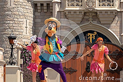 Goofy dancing with The princess and the frog characters in Magic Kingdom 2 Editorial Stock Photo