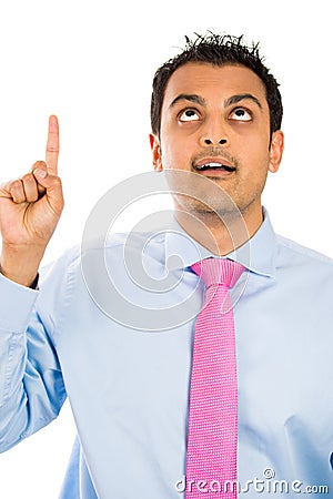 goofy, idiot, lamebrain, numbskull, nerd, geek, looking and pointing up Stock Photo