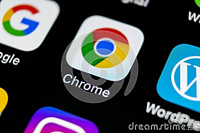 Google Chrome application icon on Apple iPhone X screen close-up. Google Chrome app icon. Google Chrome application. Social media Editorial Stock Photo