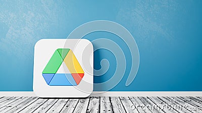 Google Drive App Logo on Wooden Floor Against Wall Editorial Stock Photo
