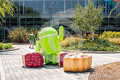 Googleplex office in Silicon Valley. Huge Google sign, Android robot sculpture and main Google office. Editorial Stock Photo