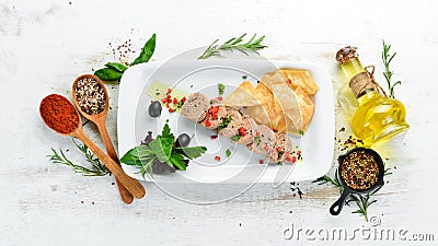 Goose liver pate on a plate. Fuagra. Restaurant dishes. Top view. Stock Photo