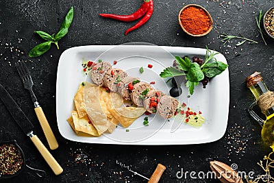 Goose liver pate on a plate. Fuagra. Restaurant dishes. Top view. Stock Photo