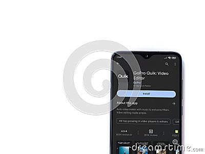 GoPro Quik - Video Editor app play store page on smartphone on white background. Editorial Stock Photo
