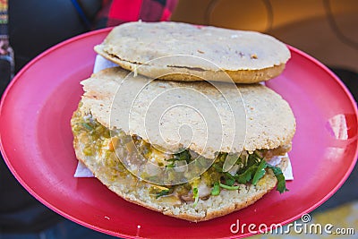 Gorditas de maiz stuffed with chicharrÃ³n. traditional mexican food Stock Photo