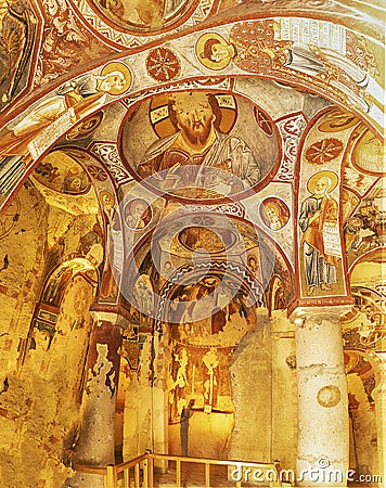 Goreme, Cappadocia, Turkey - 15.12.2021: Frescos and murals in ancient cave church painted in directly onto rock Editorial Stock Photo