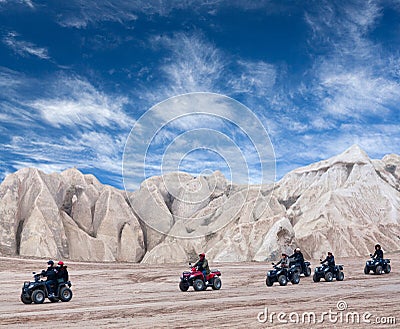 Happy tourists enjoying a quad bike ride in Cappadocia, Turkey Editorial Stock Photo