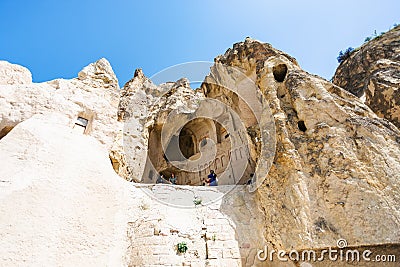 Visitors in ancient Dark Church in Goreme Editorial Stock Photo