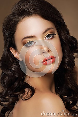 Gorgeous Alluring Lady with Tress and Bronzed Skin Stock Photo