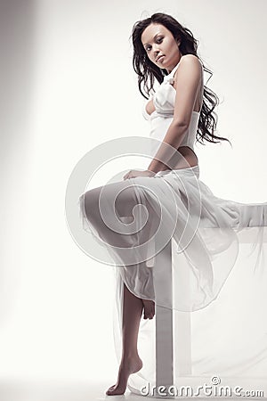 Gorgeous asian woman in white dress Stock Photo