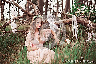 Gorgeous Boho Bride With Dream Catchers In Forest Stock Photo