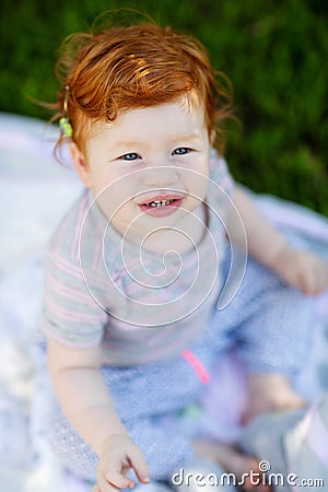 Gorgeous cute red haired little girl Stock Photo