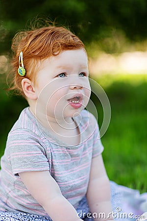 Gorgeous cute red haired little girl Stock Photo