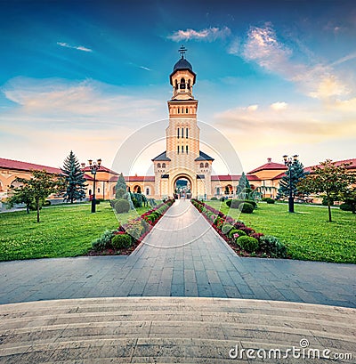 Gorgeous evening view of bell tower of Reunification Cathedral, Fortified churches inside Alba Carolina Fortress. Splendid sunset Stock Photo