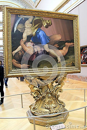 Gorgeous image of David and Goliath, framed and on display, The Louvre, Paris, France, 2016 Editorial Stock Photo