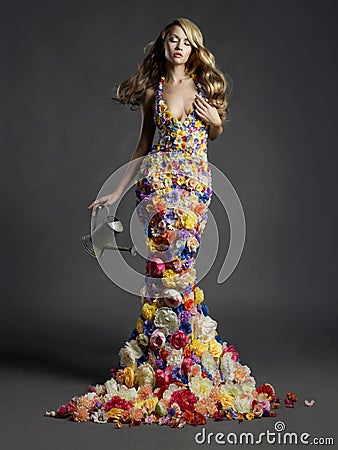 Gorgeous lady in dress of flowers Stock Photo