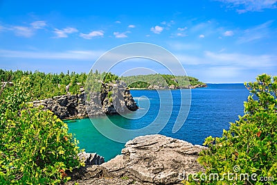 Gorgeous landscape view of great inviting Cyprus lake tranquil, turquoise water at beautiful Bruce Peninsula, Ontario Stock Photo