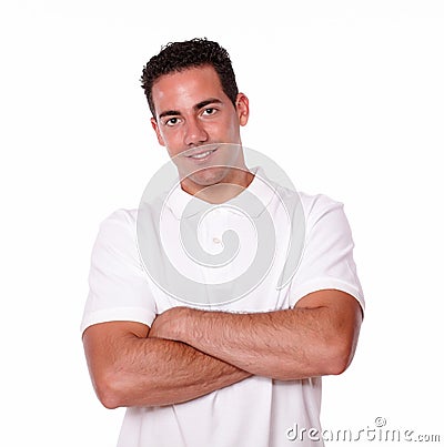 Gorgeous latin young man crossing his arms Stock Photo