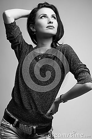 Gorgeous model looking up medium shot black and white Stock Photo