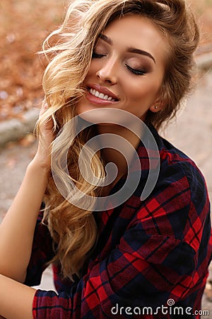 Gorgeous sensual woman with blond hair in casual clothes Stock Photo