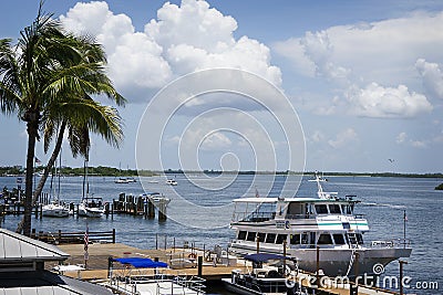 A gorgeous view of the Gulf Bay with boats and white puffy clouds in Ft.Myers Beach, Florida. Editorial Stock Photo
