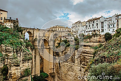 Gorgeous view of Ronda,Andalusia,Spain. Puente Nuevo New Bridge over Guadalevin River.Old Stone bridge,town at the edge of cliff Editorial Stock Photo