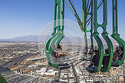 Gorgeous view of tourists on Stratosphere tower carousel over Las Vegas. Sky Pod - Stratosphere. Editorial Stock Photo
