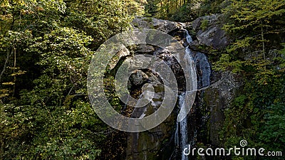 A Gorgeous Waerfalls Flows In A Mountain Envrionment Stock Photo