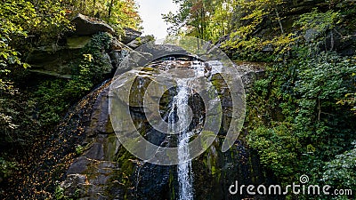 A Gorgeous Waerfalls Flows In A Mountain Envrionment Stock Photo