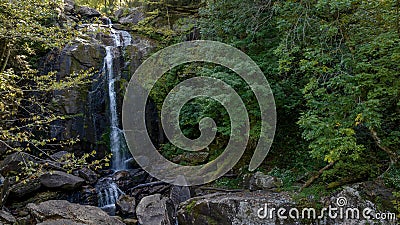 A Gorgeous Waerfalls Flows In A Mountain Envrionment Stock Photo