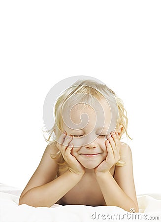 A gorgeous young boy making a wish Stock Photo