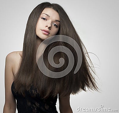 Gorgeous young woman with long, shiny hair Stock Photo