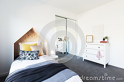 Gorgeous young girl`s bedroom beautifully styled Stock Photo