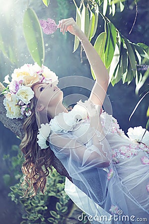 Gorgeous ypung lady with the flowery dress Stock Photo