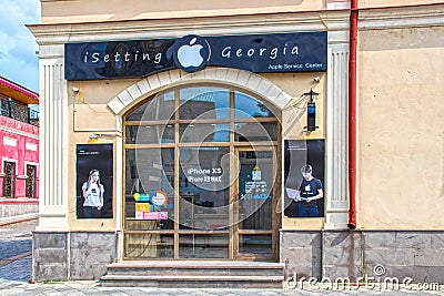 ISetting Store that sells and works on Apple products on street corner in the town of Gori Georgia Editorial Stock Photo