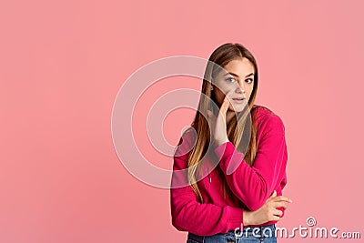 Gossip concept. Beautiful teenager girl closes hand and reveals secret Stock Photo