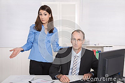 Gossip and harassment under business people on workplace - critic, chicane and censure. Stock Photo