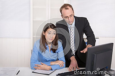 Gossip and harassment under business people on workplace - critic, chicane and censure. Stock Photo