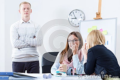 Gossip in the office Stock Photo