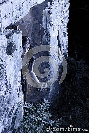 Goth girl in doorway Stock Photo